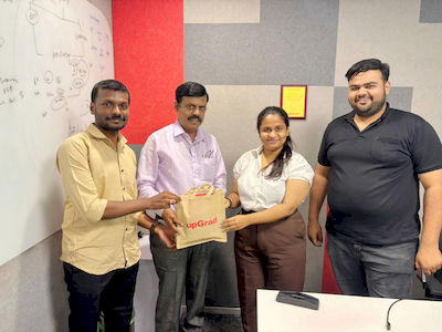 upGrad Ahmedabad office - student and parents with the counselling team after their study abroad session